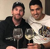 Injured Lionel Messi and Luis Suarez celebrate together after El Clasico victory