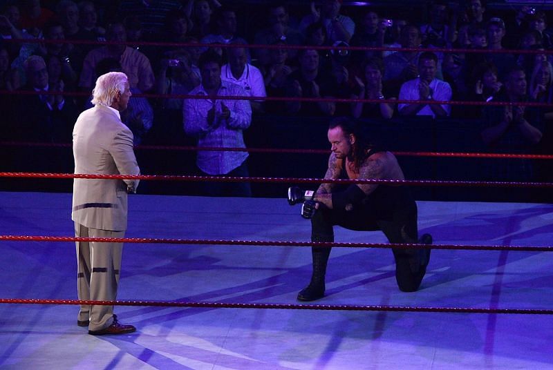 Undertaker paying his respects to the retiring Ric Flair at the end of Raw