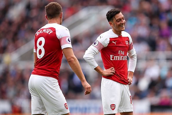 Mesut Ozil and Aaron Ramsey have had different roles this season