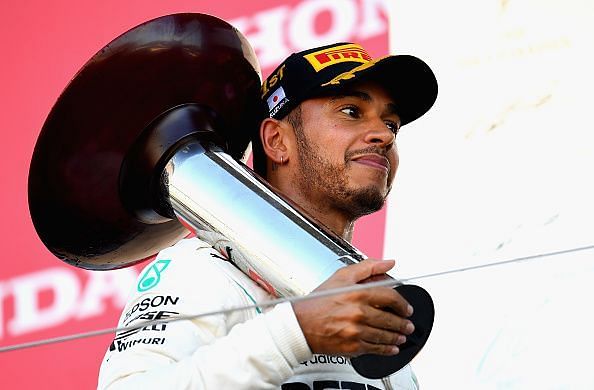 Lewis Hamilton celebrates after his recent win in Japan