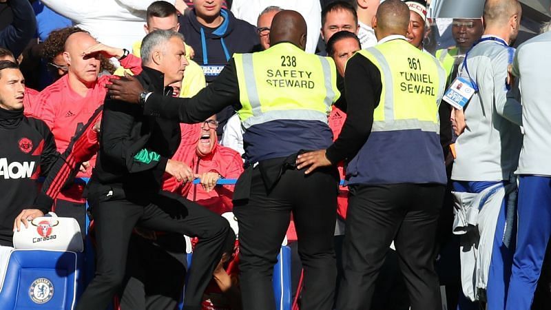 Jose Mourinho getting involved in the touchline brawl: