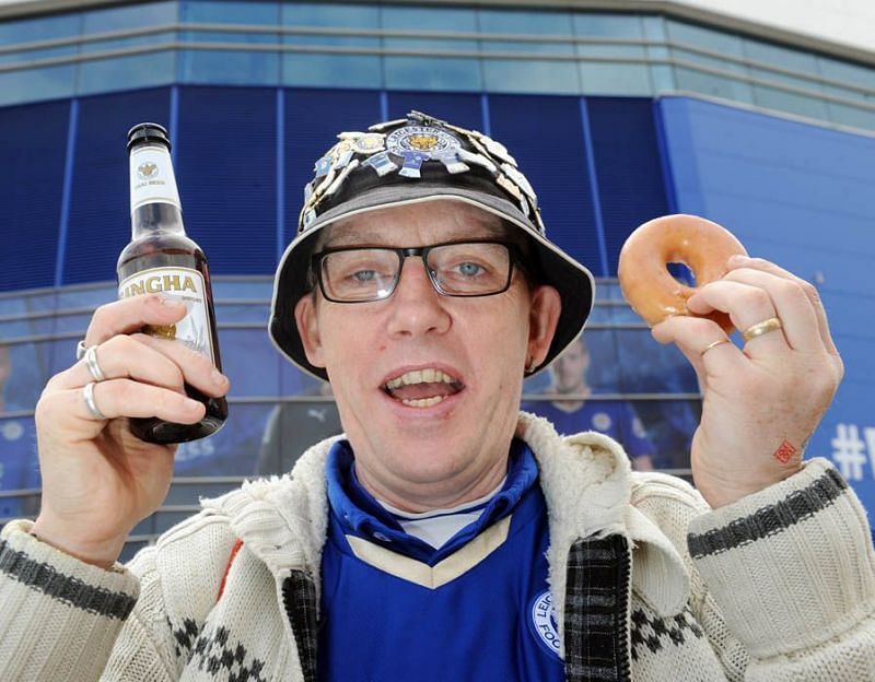 EA fan with beer and doughnut