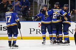 Perron's hat trick lifts Blues to over Flames 5-3