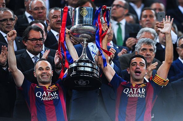Xavi and Iniesta won everything on offer with Barcelona and Spain