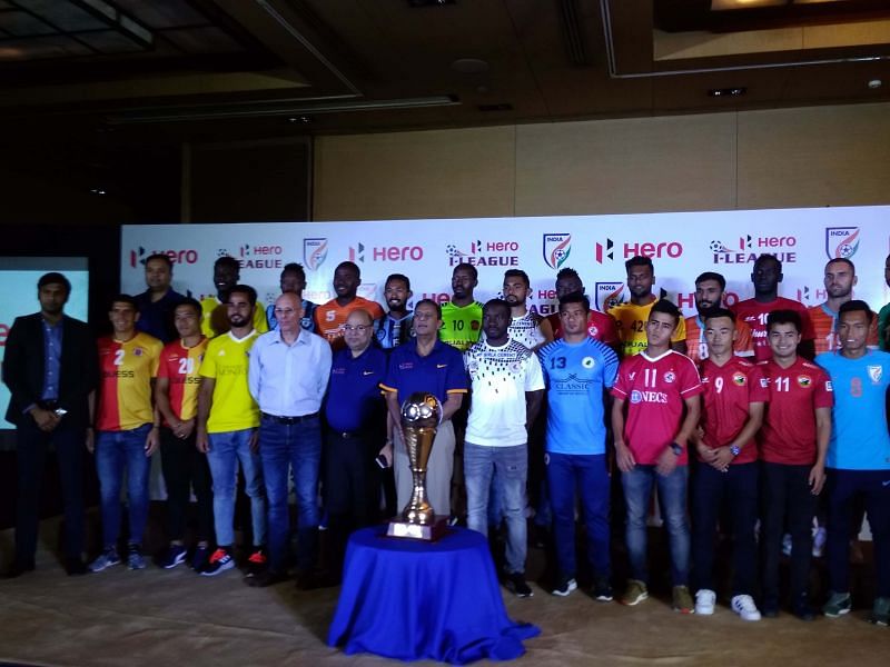 Kushal Das (bottom row, behind trophy) with players of other teams.