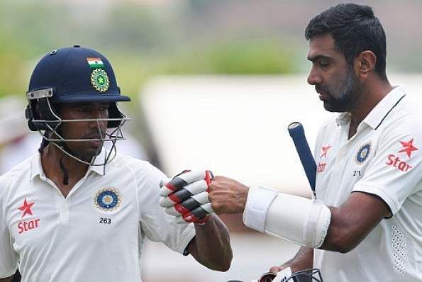 Ashwin and Saha involved in a double century partnership