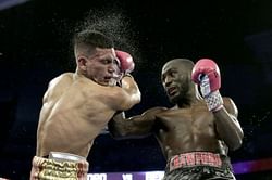 Crawford stops Benavidez late in last round to keep WBO belt