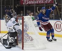 Quinn gets first win, Rangers beat Sharks in overtime 3-2
