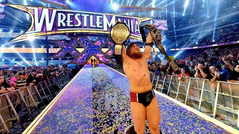 Daniel Bryan celebrates after winning the WWE World Championship.
