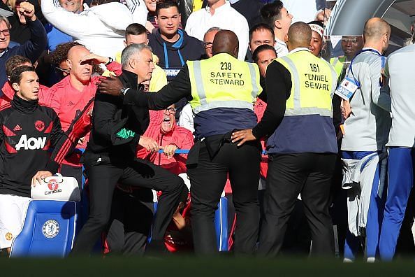 Mourinho leaps out of his seat to angrily confront Ianni