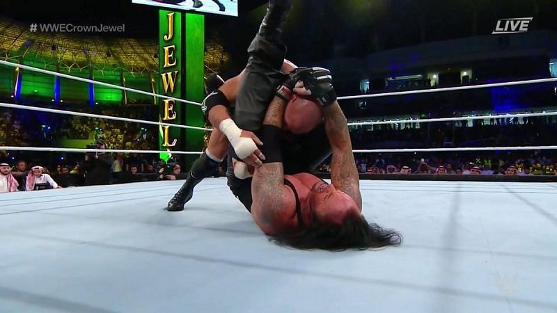 It was a shocking main event that saw Kane hit so hard that he lost his mask