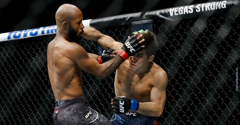 Henry Cejudo attempts to land a looping right hand during his championship fight against 