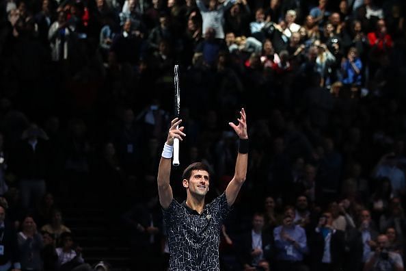 Novak Djokovic celebrates his win over Cilic at the 2018 Nitto ATP Finals