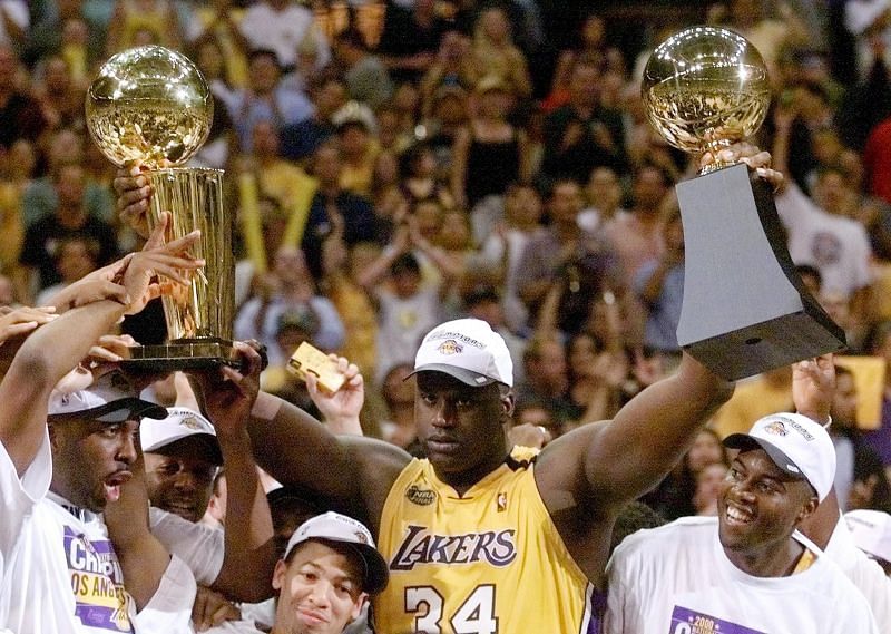 Shaquille O&#039;Neal with the Finals MVP trophy&Acirc;&nbsp;and Larry O&#039;Brien trophy