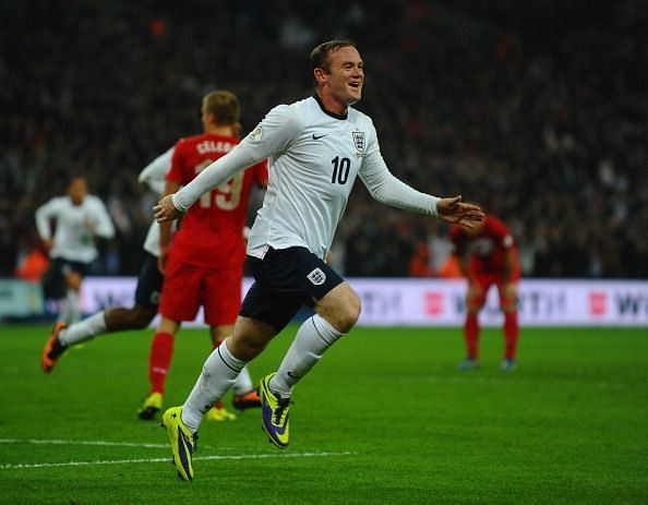England v Poland - FIFA 2014 World Cup Qualifier: Rooney celebrates scoring the winner that broke the deadlock.