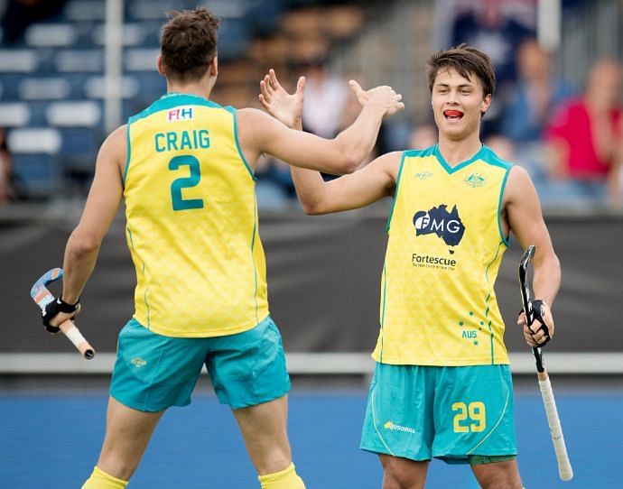 Australian players Tom Craig and Timothy Brand celebrate after the latter scores a goal in a warm-up match against Germany
