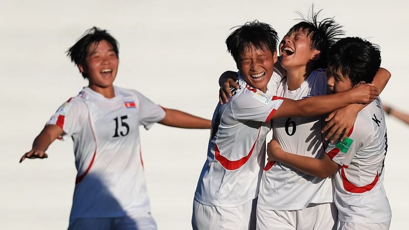 Ri Su-Jong no 6 from Korea DPR celebrates with her teammates after scoring the crucial second goal (Image Courtesy: FIFA)