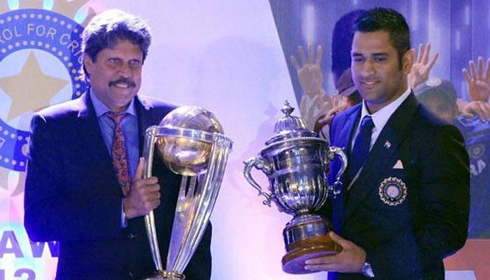 Kapildev and Dhoni with World Cup Trophies