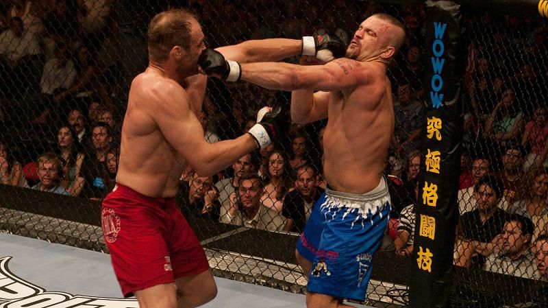 Randy Couture slugs it out with Chuck Liddell in the headliner