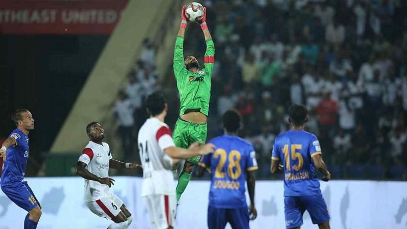 Amrinder Singh making a save against North East United FC