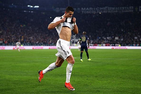Cristiano Ronaldo celebrates after scoring against Manchester United