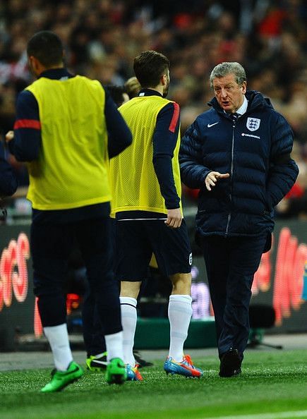Roy Hodgson giving instructions to Lallana while on England duty