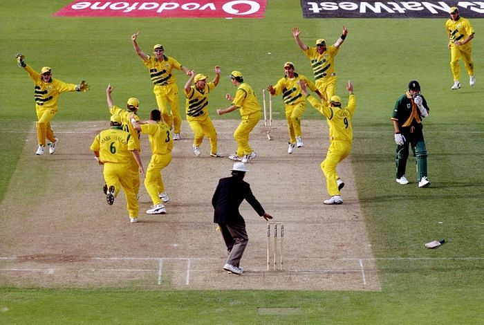Australian players celebrate after holding South Africa to a tie in the 1999 semi-finals.