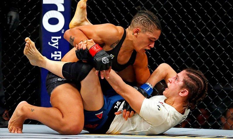 Sijara Eubanks (top) showing her dominance on the ground against Roxanne Modafferi (below)