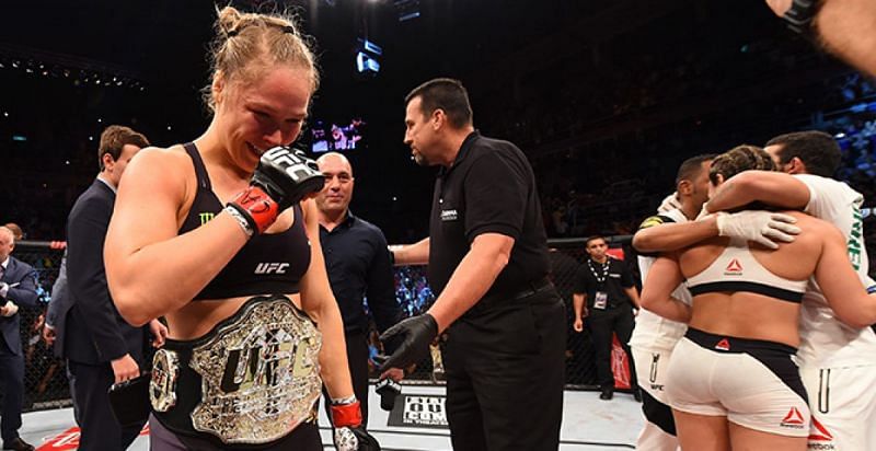 Rousey celebrates her last ever MMA victory over Bethe Correira at UFC 190