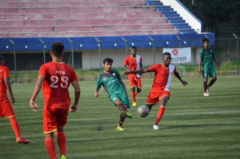 Yogendra Thapa of South United plays a pass forward