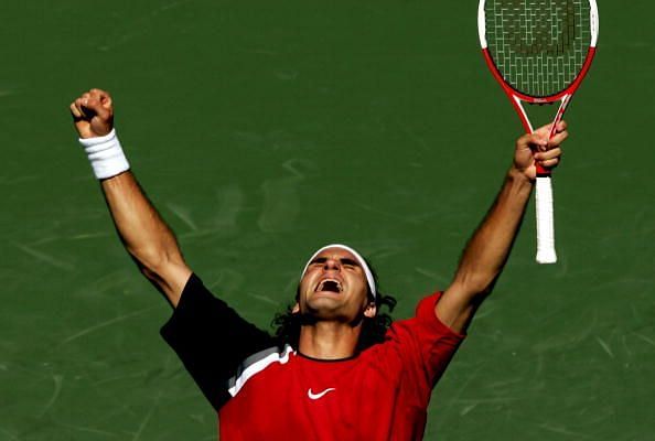 Federer celebrates after defeating Nadal