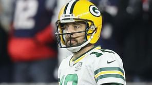 Rodgers not giving up on Packers' playoff hopes