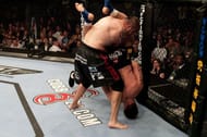 Frank Mir snaps Tim Sylvia's arm in the match-winning armbar