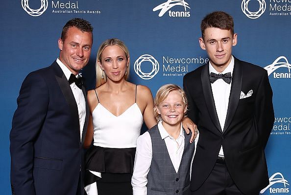 Lleyton Hewitt poses with his family after winning the Newcombe Medal