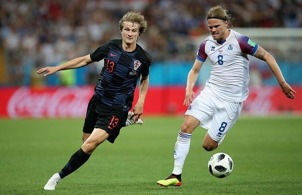 Tin Jedvaj&#039;s (left) late brace gave Croatia a vital win over Spain.