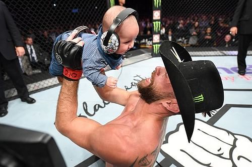 Donald 'Cowboy' Cerrone celebrating with his son in UFC Fight Night 139