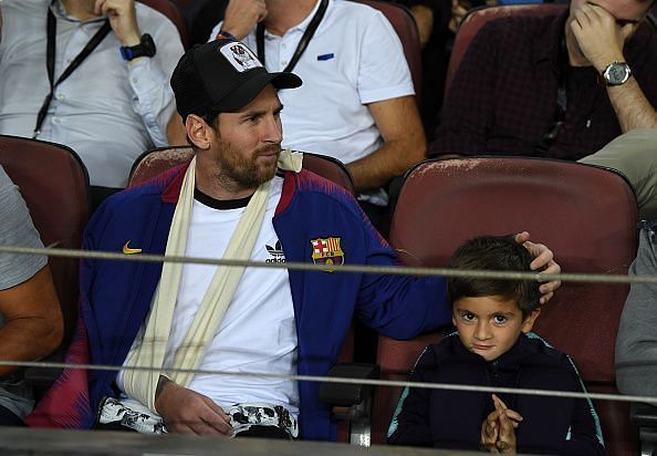 Lionel Messi with his son Thiago at the Camp Nou