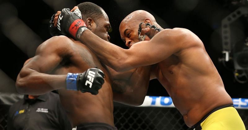 Anderson Silva (right) working the clinch with Derek Brunson (left) during their fight at UFC 208
