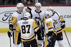 Pens' GM Rutherford signs new deal, trades for Pearson
