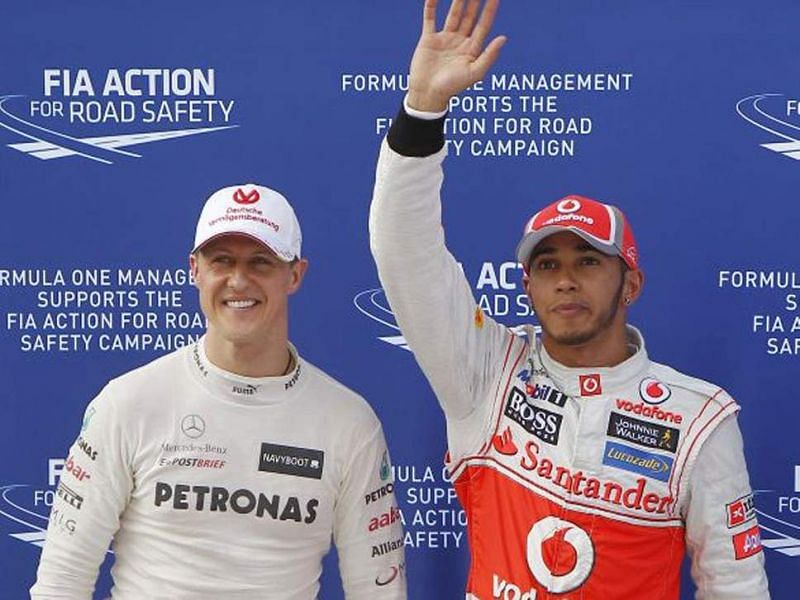 Lewis with the man he replaced at Mercedes