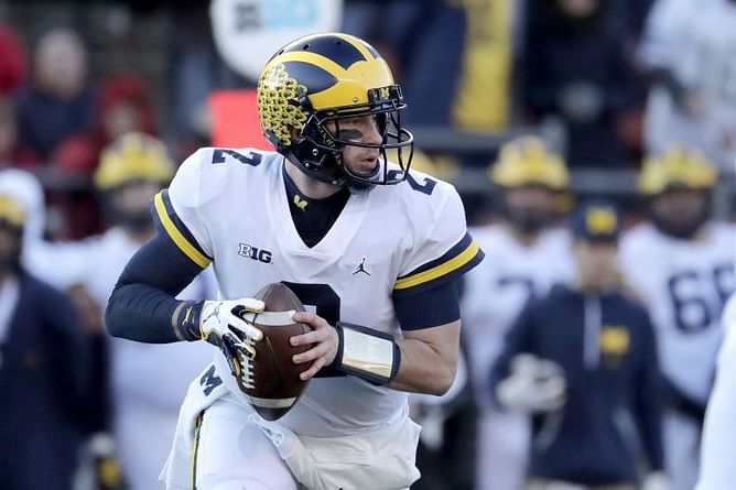 Patterson throws 3 TDs, No. 4 Michigan beats Rutgers 42-7