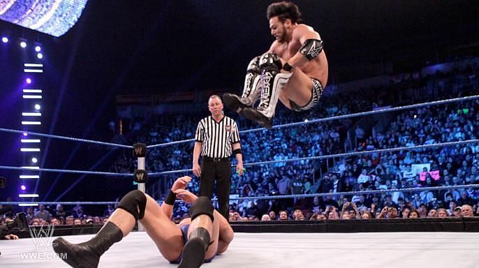 Justin Gabriel comes sailing down from the top rope with a 450 splash.