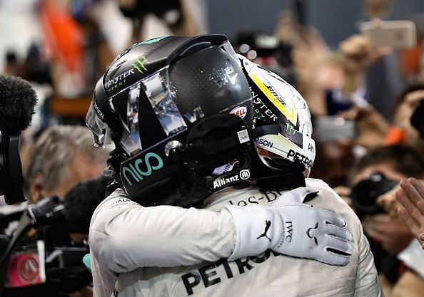 The two Mercedes rivals embrace each other after a hard-fought season-long battle.