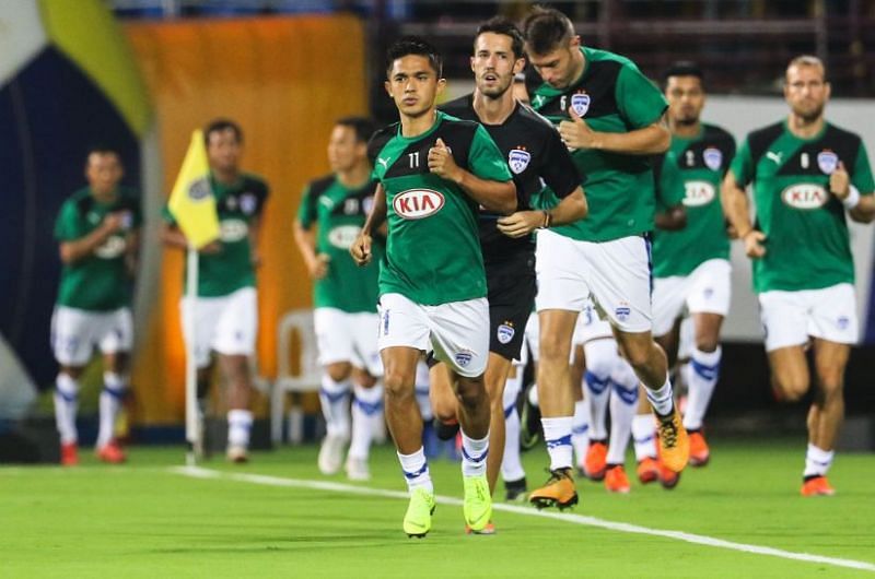 Bengaluru FC players warm-up ahead of the match against The Blasters