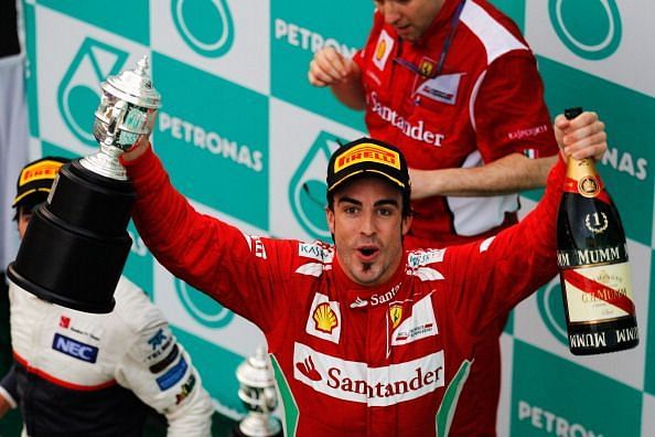 Alonso celebrates his win at the 2012 Malaysian F1 Grand Prix