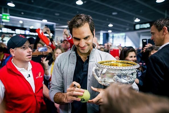 Roger Federer with the 2018 Australian Open trophy