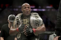 Cormier chokes out Lewis; defends 2nd title at UFC 230