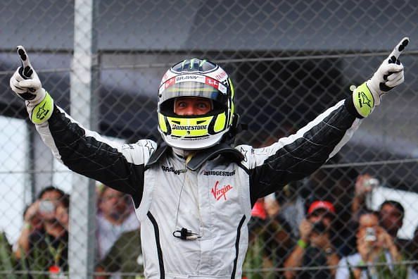 The Brit won the title in Brazil much to the delight of the British fans and of course his father the late John Button
