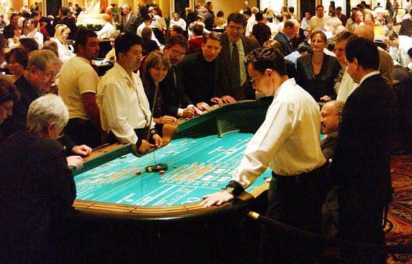 a view of a glamorous crap table in the casino