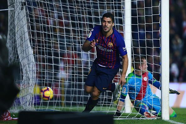 Suarez took on the goal-scoring responsibilities in the absence of his strike-mate